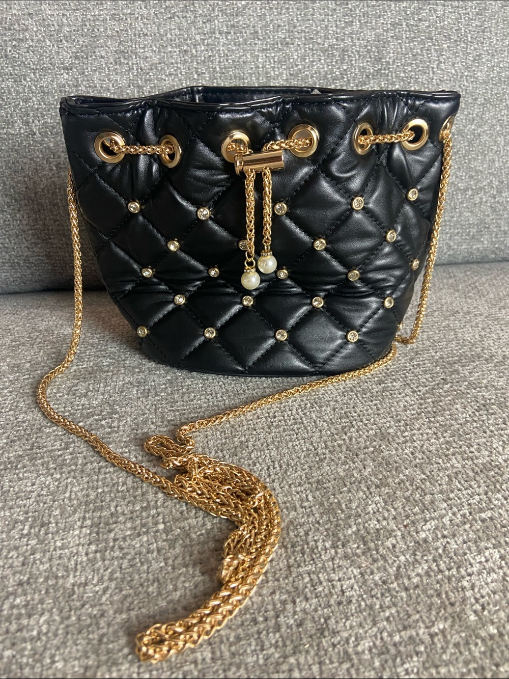 Black Quilted Crossbody Bag with Gold Chain and Pearl Tassels